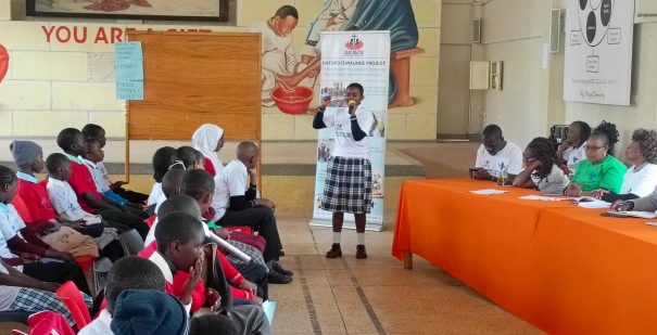 A girl present the issues affecting children in her Zone